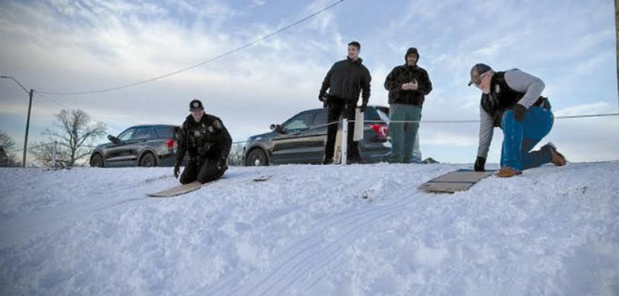 The community’s police department gathered with the kids to be a kid for a short time, sledding with and showing the kids that police officers are really the good guys, even in sub zero weather. by Jessica Lynn