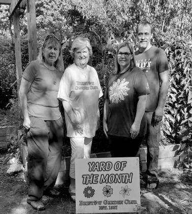 From left, Nancy Findlay and Kathy Costner of the Bristow Garden Club with Melissa and Chris Francis. courtesy photo