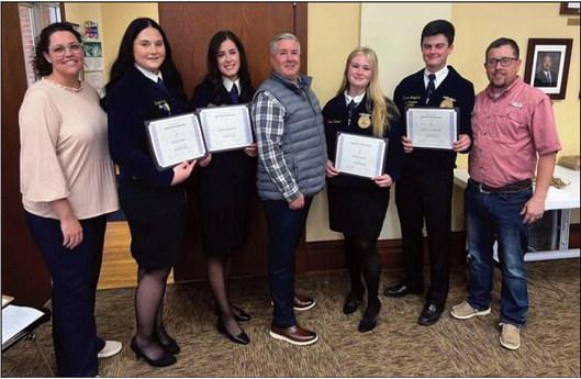 The Bristow Board of Education, at its regular meeting, recognized four Bristow High School seniors for earning their State FFA Degree. This degree is the highest attainable degree at state level. Out of 28,000 statewide members, only 758 FFA students earned this degree. Picture from left, Rashelle Lundy, ag instructor, Kinlee Snell, Abbey Roberts, Billy Bryant, board member, Sadie Varner, Turner Longacre, and Jo McGovran, ag instructor. courtesy photo