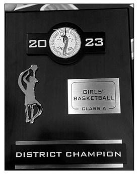 courtesy photo The Depew Lady Hornets basketball team secured the district championship last weekend. The ladies proudly display their championship plaque.