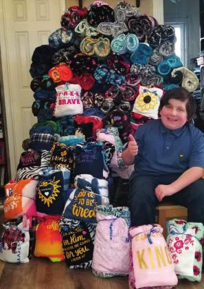 Marshall McRae, age 10, designs blankets to give to the elderly. courtesy photo