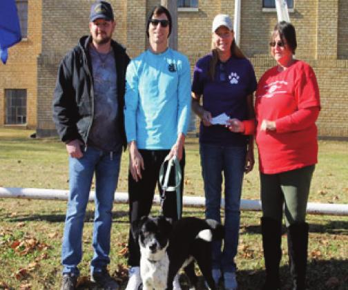 From left, American Legion Commander Justin Adair, Rodger Rundenza, Beth Roberts with Bristow Barnyard Animal Rescue and American Legion Auxiliary Vice President Pam Tepstein. Front row, Sampson. Stephanie Summers photo