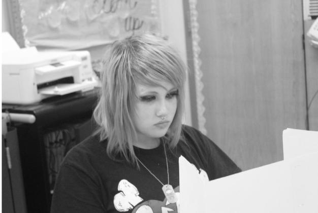 Penelope E. (8th grade), taking a benchmark test courtesy photo