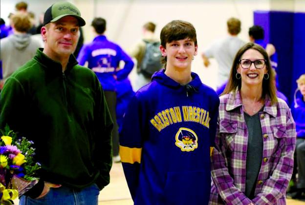 Dax Davis with parents Clint Davis and Heather Odell.