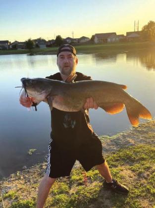 Joshua Peery caught this nice channel catfish in Rogers County in a farm pond courtesy photo
