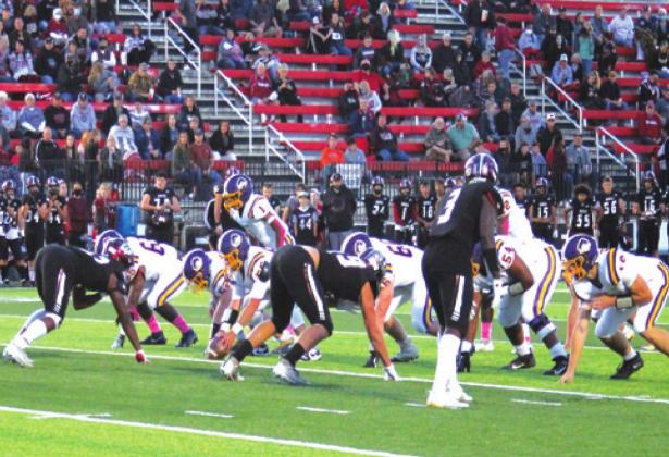 The Pirate offensive team runs a play against Wagoner. courtesy photo