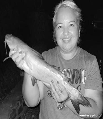 Marie R. with a channel catifsh she caught at Lake Lawtonka.