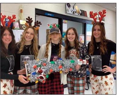These girls won the Snowflake running four. Pictured with their trophy is Samantha Peeler, Ashley Hall, Lillian Thatcher, Lauren Carrie and Katrina Ash. They were first out of seven teams.