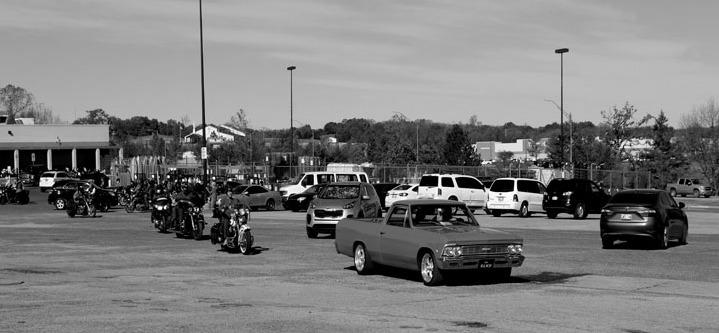 Motorcycles and cars gathered Saturday morning for the annual Hawg Wild Toy Run.