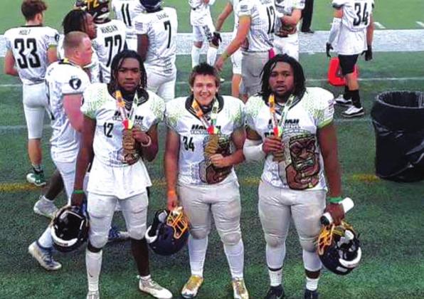 Stephon Tolon, Caleb Ritchie and Kaylon Tolon played in the Tiki Bowl. The boys held several fundraisers to get the money together to attend the Tiki Bowl which was supposed to have been held in Hawaii but due to circumstances, the bowl had to be held in Florida this year. coutesy photo