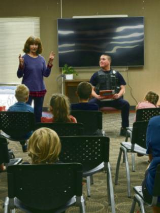 Officer Jayce Hightower, Bristow Police Department, attend Miss Elsie’s storytime as part of a community outreach partnership. Officer Jayce read the children a book about bullying, giving them tips on how to recognize and stand up to bullies, and was kind enough to answer all of their questions. courtesy photo