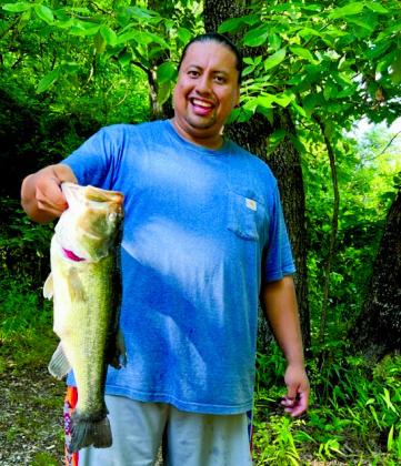 Jeremy Deere with a largemouth bass caught at Eucha Lake. courtesy photo