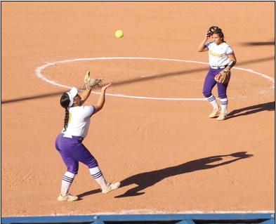 Albaney Pritchard makes an out with Makenna Ingram. courtesy photo