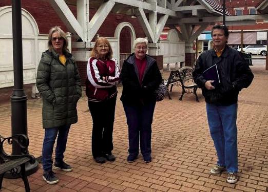Bristow Historical Society board members Tammie Levin, Gorgia Smith and Paula Atwell discuss the renovations of Town Square with Joe Trigalet.