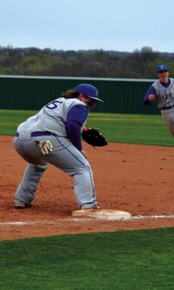 Matthew Brown throws ball to Christopher White for the out at 1st base. courtesy photo