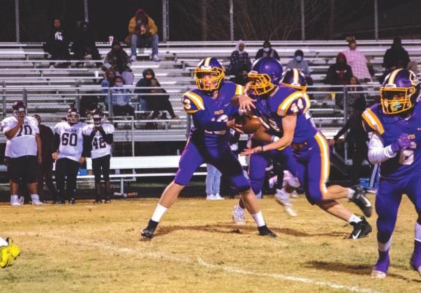 The Pirate offense hands off the ball. courtesy photo
