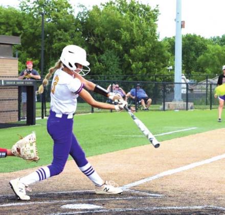 courtesy photos Sophomore Ava Yocham swings the bat.