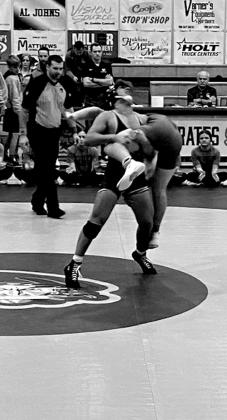 Hank Powell takes the opponent to the mat. courtesy photo