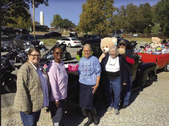 The Hawg Wild Toy Run was a huge success with two pickup beds full of toys for area children. Pictured are Katy Anderson, Rita Moore, Sharon VanOrsdol, Nancy Grieves and JR Kennedy. courtesy photo