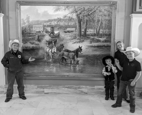 Creek County 4-H kids find and admire art by Wayne Cooper, from Depew, at the Oklahoma State Capitol. The Braden kids, from Bristow 4-H, are showing their challenge coins from Governor Kevin Stitt. courtesy photo
